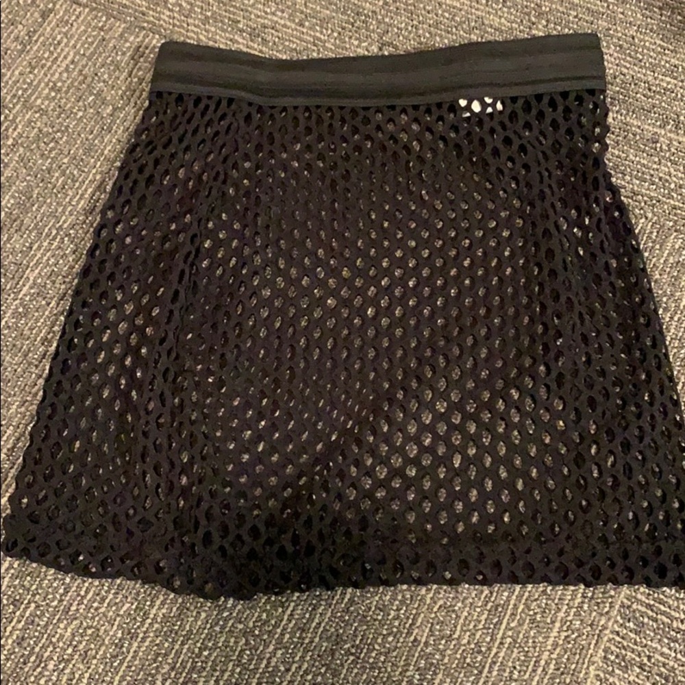 Fishnet mini skirt
